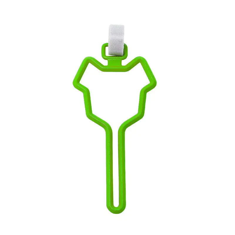 Green pet waste bag clip with a secure white fastener, designed to easily attach to leashes, belts, or bags for convenient pet waste management.